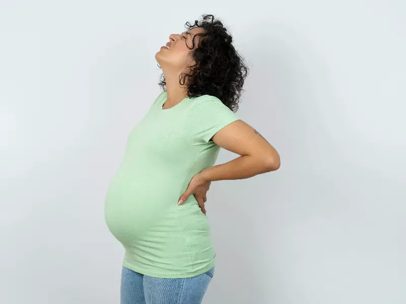 Pregnancy Chiropractor For Pregnant Moms Near Me in Aurora, CO. Low Back Pain Caused by Pregnancy.